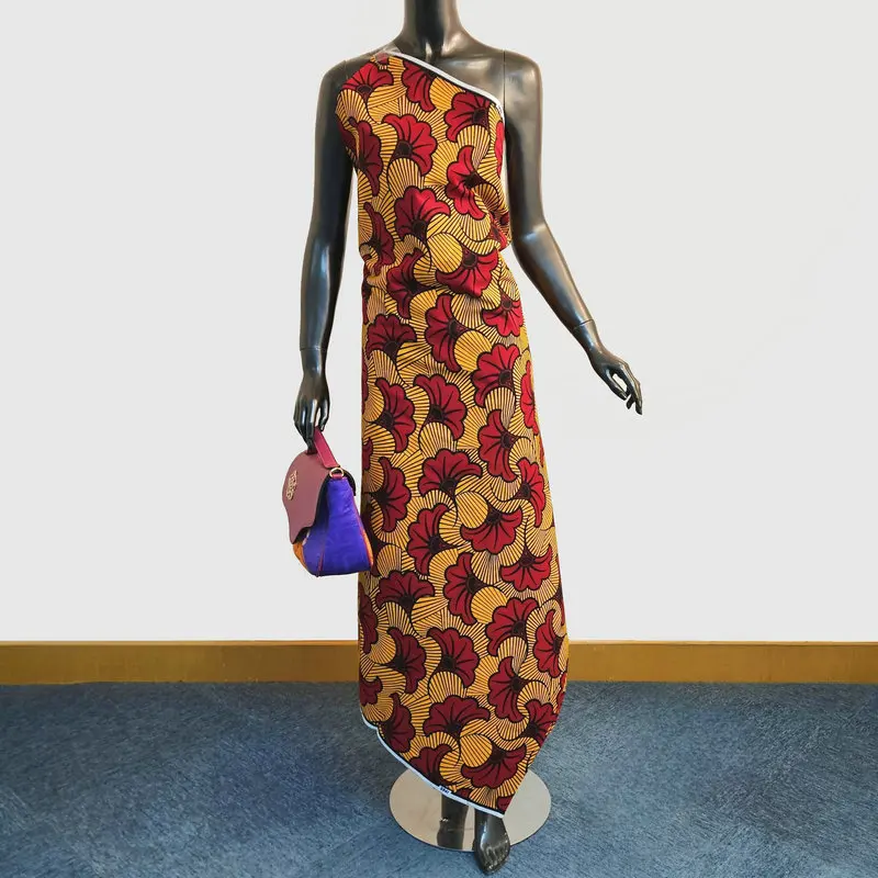 Red Dutch Wax Hollandaise Fabric | 100% Cotton African Textile Red Dutch Wax Hollandaise African fabric made of 100% cotton — veritable Holland wax textile for making clothes.